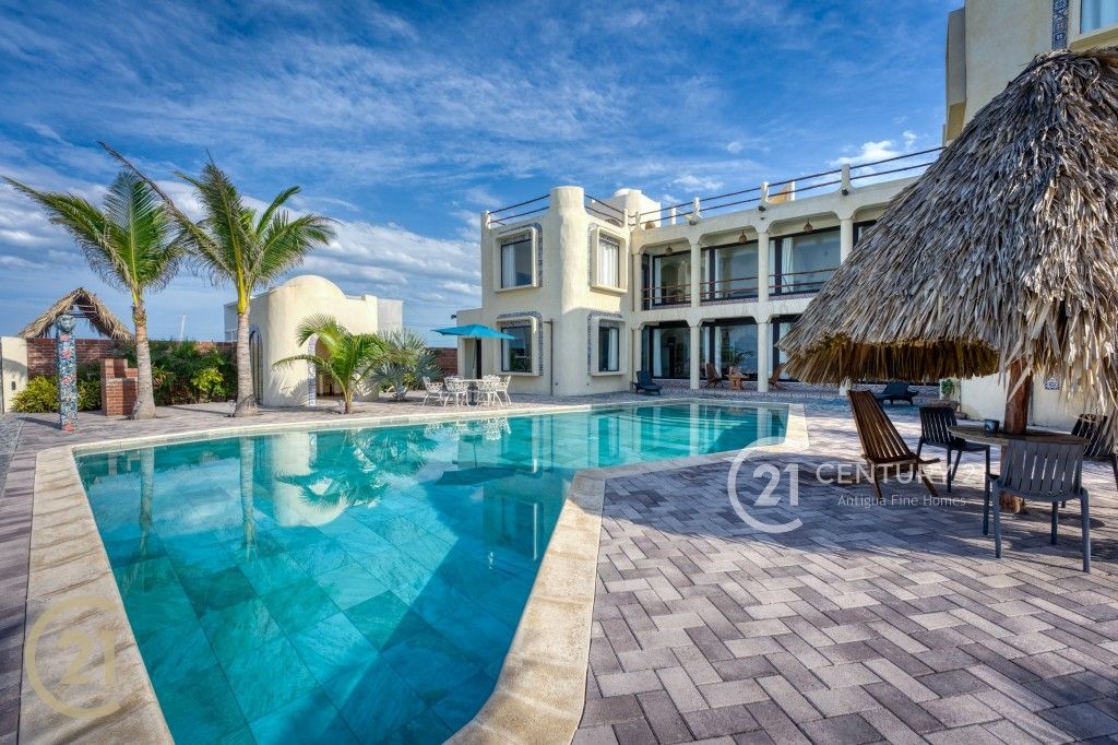 Exceptional Beachfront Residence with Direct Ocean Access