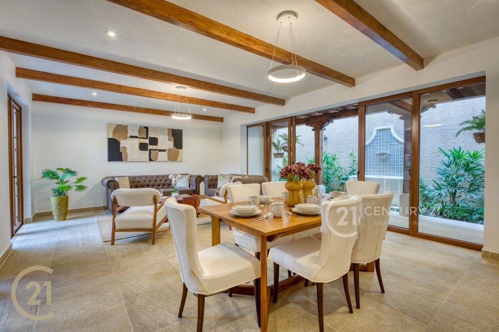 Elegant 3-Bedroom Spanish-Style Home with Courtyard Pool and Volcano Views